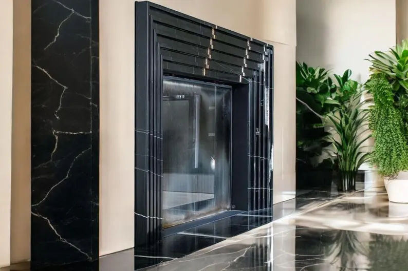 Hand-Carved Nero Marquina Marble Fireplace Mantel: Custom Luxury Design